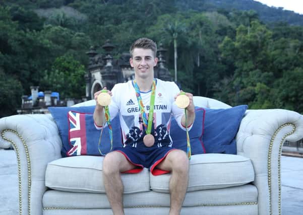 Max Whitlock on the Britannia Sofa by DFS made for the Olympics.