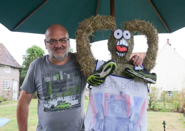 Flamstead Scarecrow Festival 2016 Bryan Thompson who helped create the Olympic themed scarecrows