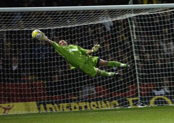 Richard Lee in action for Watford.