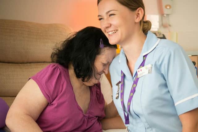 Hospice of St Francis nurse Georgia Berry with her patient Maureen
