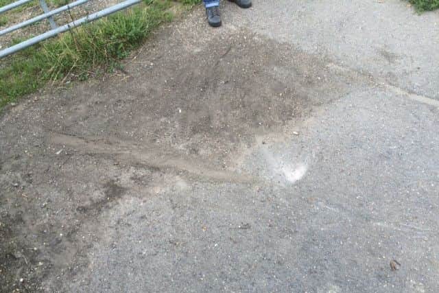 The drag marks which thieves made as they stole Mr Cooley's bike