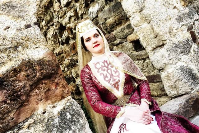 Daria Kulsh in traditional Ingush costume