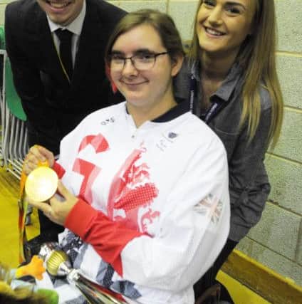 Jess Stretton at morning assembly at Longdean School, Hemel Hempstead.With, from left, deputy head girl Emily Rogers, head boy Adam Hatchett and school council chair Lydia Clark.
