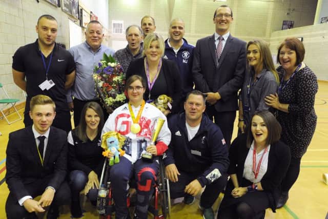 Jess Stretton at morning assembly at Longdean School, Hemel Hempstead.With some of the people who helped her.