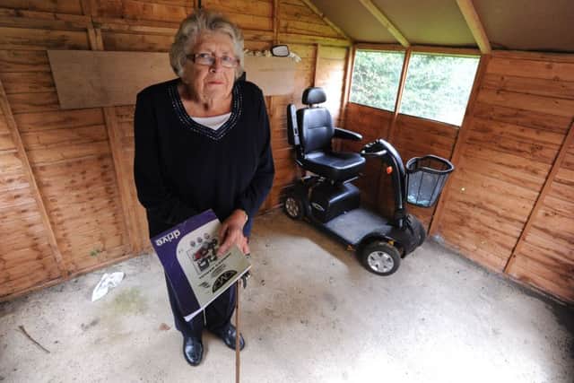 Besta Humphrey in the scooter shed at Southernwood Close, Hemel Hempstead. Two scooters were stolen from
there and the remaining one has been damaged.