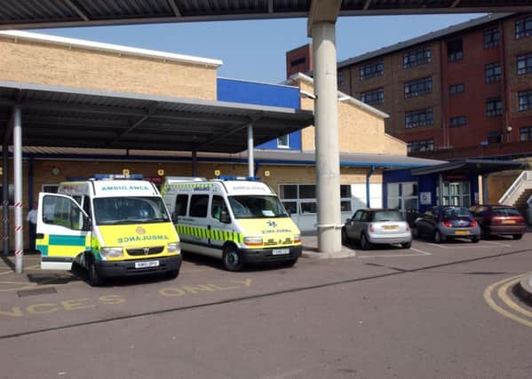 Ambulance waiting at Hemel Hempstead Hospital in 2004 when it was a full hospital with an A&E