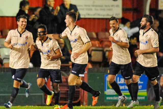 Wealdstone celebrate their third. Picture: Terry Rickeard.