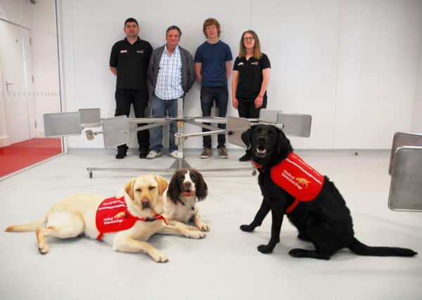 DEMAND engineer Malcolm Brown and student designer Luke Denby at Medical Detection Dogs