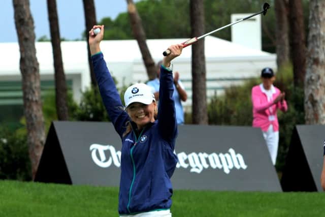 Hannah Screen celebrates her victory.