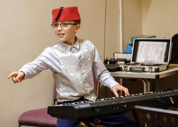 A FEZ-TIVAL OF MUSIC: Sam Kemp, photographed by Paul Watkins