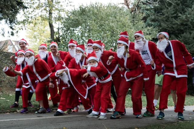 Santas get in training for the Santa Dash