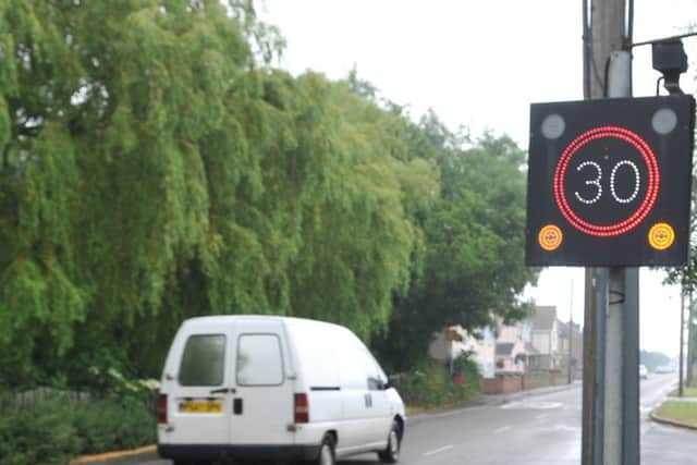 Paul Finney by the traffic speed indicator on Westfield Road, Manea. ENGANL00120130620175534