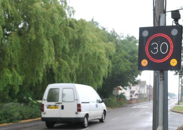 Paul Finney by the traffic speed indicator on Westfield Road, Manea. ENGANL00120130620175534