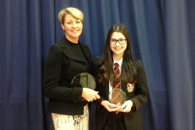 Laura Lowe with her trophy and head of house Donna Young