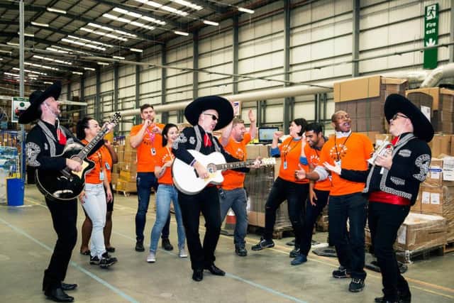 Amazon staff wear T-shirts and enjoy some entertainment and benefits during the Amazon Black Friday : LTN2 Hemel
Lauraine Mwadeyi HR -
Hindaugas Simutis HR- Afzol Miam ( batman) -Inbound stow-
Kate (Aikaterini) Skordyli inbound
Anabella Presak Stow
Brian Stout -inbound -
Michaela Ciomaga Inbound Stow
Edward Nyamukoho inbound
Michael Kinsella Stow
- with band
Andy Smith ( trumpet) Graeme Doms , Stuart Moore ( black guitar)
24.11.2016
Photo©vickicouchman
vickicouchman.com
07957226911