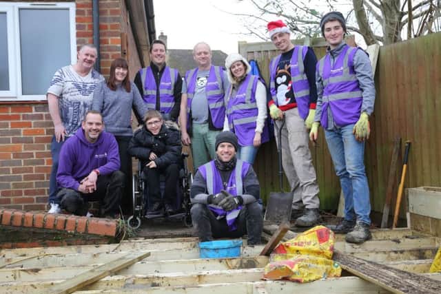 The WellChild team with Jamie, his mum Christine, and dad Eddy (back left)