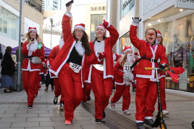 Hospice of St Francis Santa Dash PNL-161112-142801009