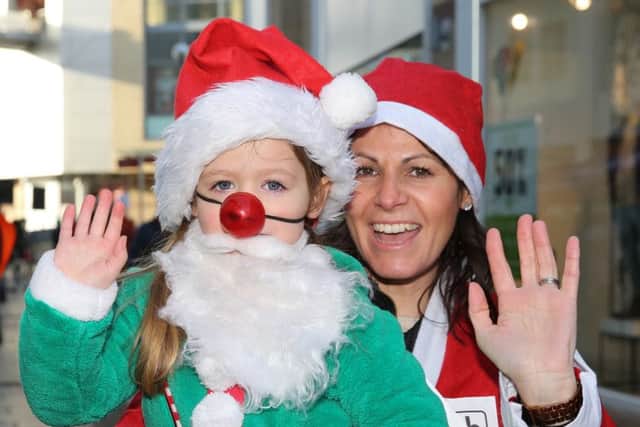 Hospice of St Francis Santa Dash Abigail and Claire Curling PNL-161112-142739009