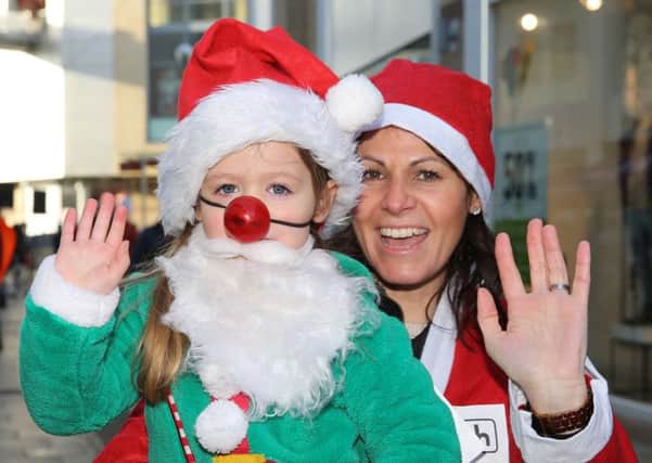 Hospice of St Francis Santa Dash Abigail and Claire Curling PNL-161112-142739009