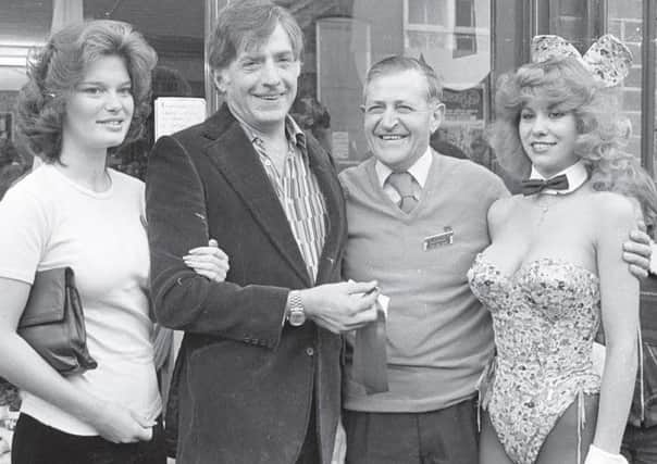 Victor Lownes (second from left) opens a new Save the Children charity shop in Tring High Street in 1978