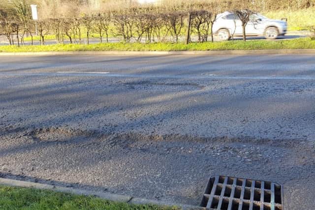 Pothole photo tweeted by Cllr Adrian England