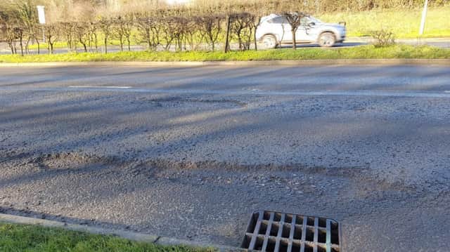 Pothole photo tweeted by Cllr Adrian England