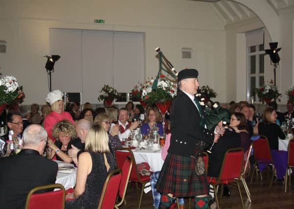 Piping in the haggis at Rennie Grove's Burns Night