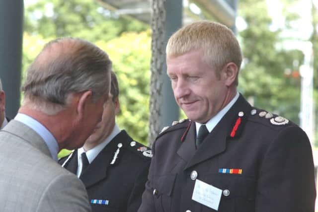 Departing chief fire officer Roy Wilsher meets Prince Charles after Buncefield