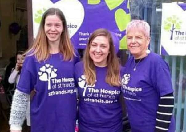 Nikki Wenham, left, with Caroline Lee from the hospice and fellow skydiver, Susie