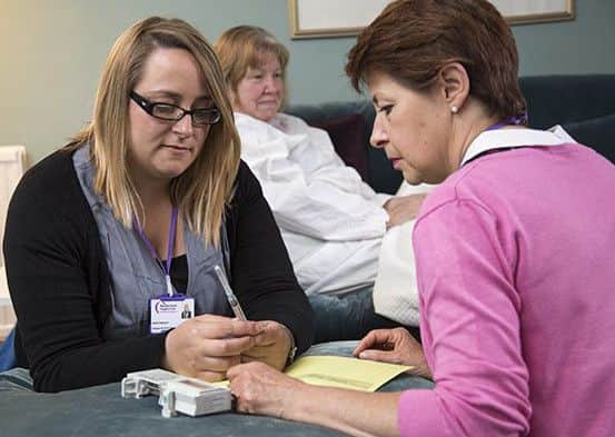 Specialist nurses in a patient's home