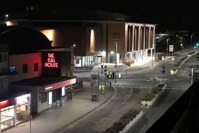 Police attending the scene of the collision outside The Forum last Thursday. Picture by Chris Hannah