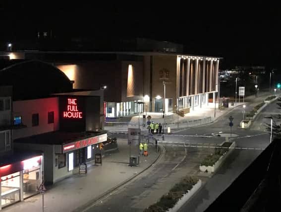 Police attending the scene of the collision outside The Forum last Thursday. Picture by Chris Hannah