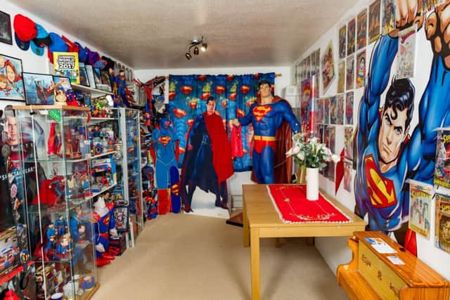 Marco Superman Zorzin, 30, currently has a staggering, 2,000 strong collection including a 6ft 10in tall statue of the superhero. Photo: SWNS