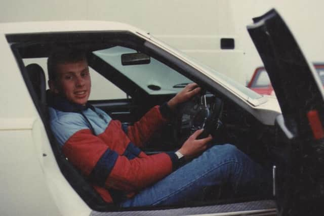 Brian in the Peugeot he brought in the year he went blind. His father still has the car