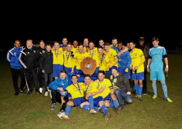 Charity Shield-winning Berkhamsted celebrate with the trophy