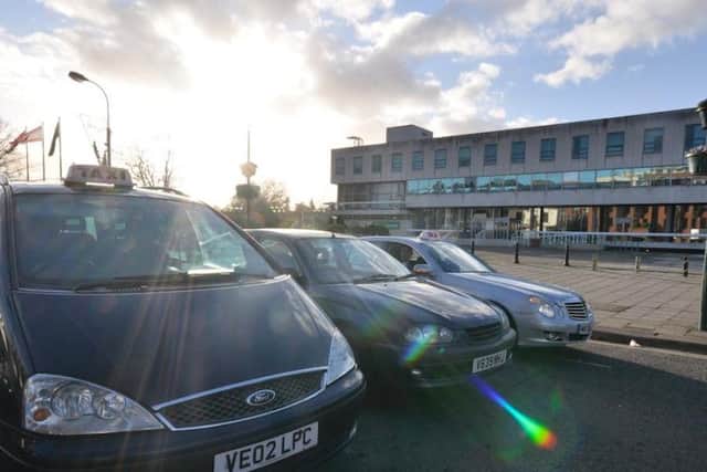Residents have been urged to use 'local' cabs by taxi drivers