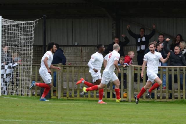 Kings Langley players celebrate after Ryan Plowright's opening goal
