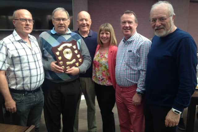 The Peter Betts Charity Shield 2017 is presented at Little Hay Golf Club to the winning team of Paul Whiter, Tony Hodson, Neil Salisbury and Robin Rose, by Mr Betts son Philip, first left, and daughter Janet.