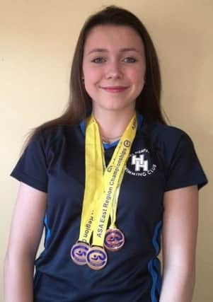 Alice Fender with her full compliment of medals