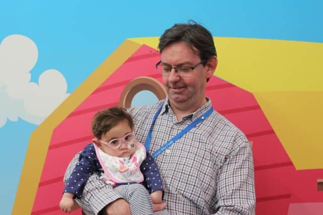 Childrens nurse Terry with a patient