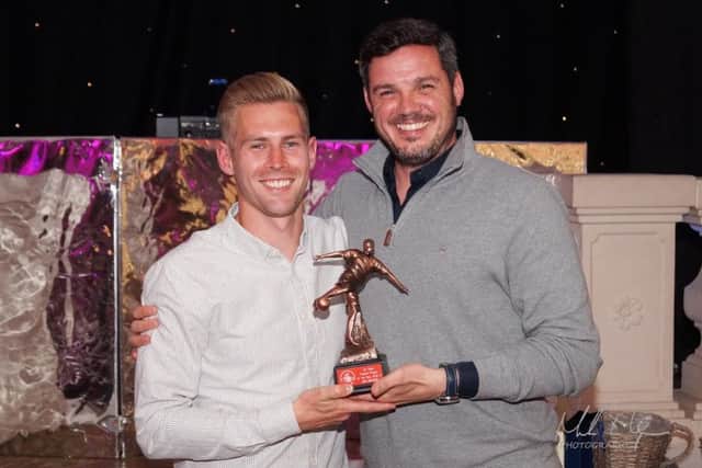 Hemels Jordan Parkes is pictured with boss Dean Brennan, after accepting the players player of the year award on behalf of ex-striker Jake Robinson at Fridays end-of-season awards night