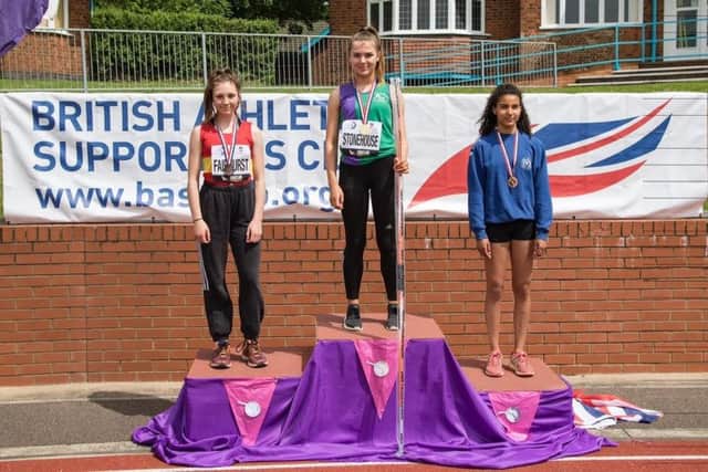 Dacorum & Tring's Tia Stonehouse on top of the podium in Loughborough