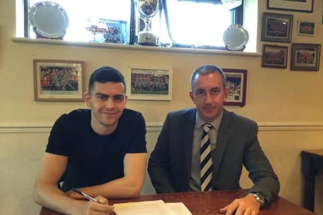 Striker Mitchell Weiss with Kings Langley chairman Jeremy Wilkins