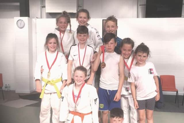 Rush Judos Samurai team which travelled to Kidderminster at the weekend. Back row, from left, Nicole Wood, Maggie Rumsby-Ferris and Ollie Cadge. Middle: Jessica Rush, Kodi Oconnall, Ollie Oconnall, Jemima Cadge and Sophie Rush. Front row : Darcey Oconnall and Harrison Oconnall