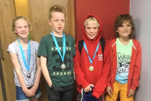 From left, Tring Swimming Clubs Lucy Bee, Jacob Geller, Oliver Denton-Sparke and Alexander Stephenson