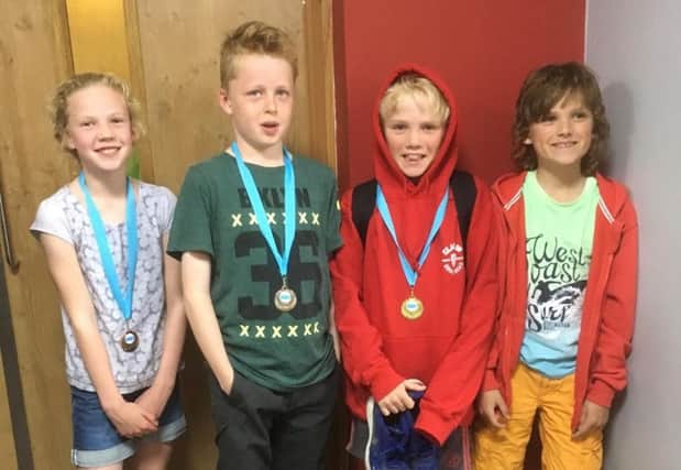 From left, Tring Swimming Clubs Lucy Bee, Jacob Geller, Oliver Denton-Sparke and Alexander Stephenson