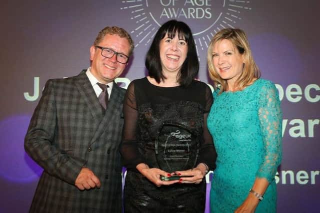 Lynne Misner receives her award