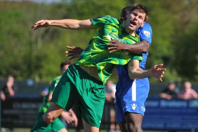 Charlie Sheringham in action for the Tudors against Wealdstone last season during his loan spell from Ebbsfleet.