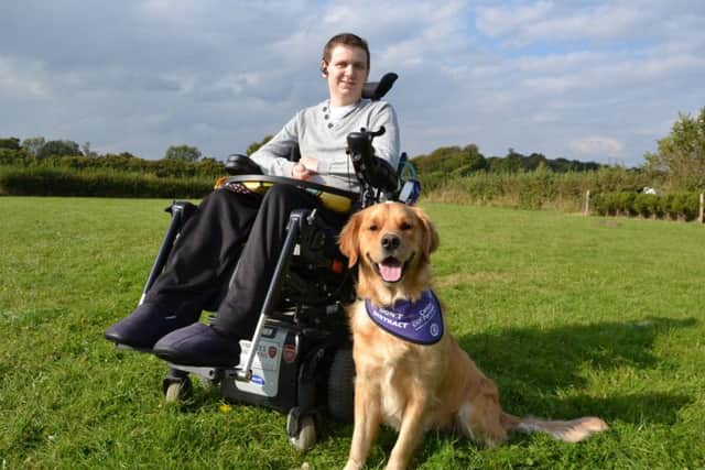 Paul Phillips with his dog Ralph connected by Canine Partners.