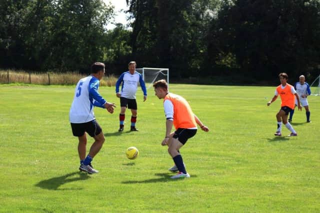 Friends raise money for Alex Hubbard who died aged 21 from a heart attack.